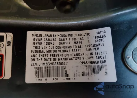2011 Honda Insight from USA, damaged, VIN JHMZE2H32BS001076